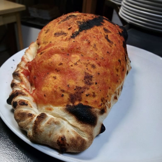 Pizzeria Capriccio: une pizza calzone